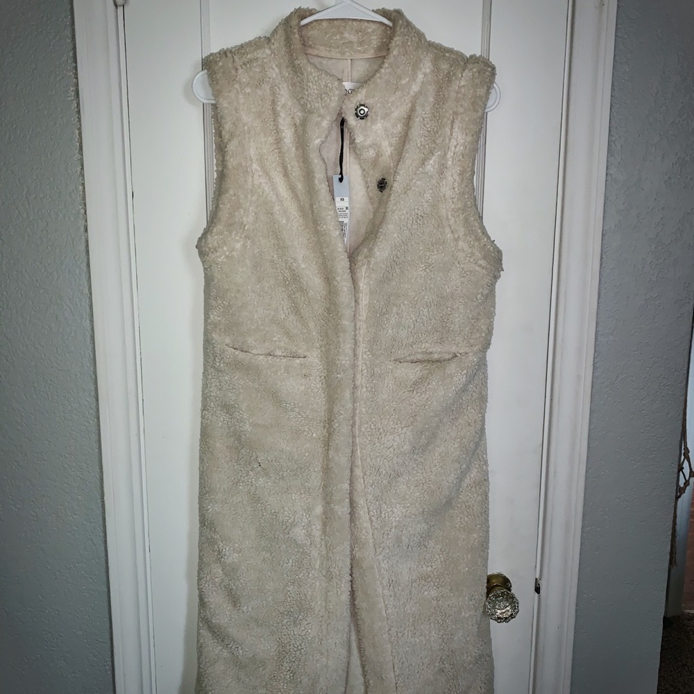 Sleeveless knee length sweater